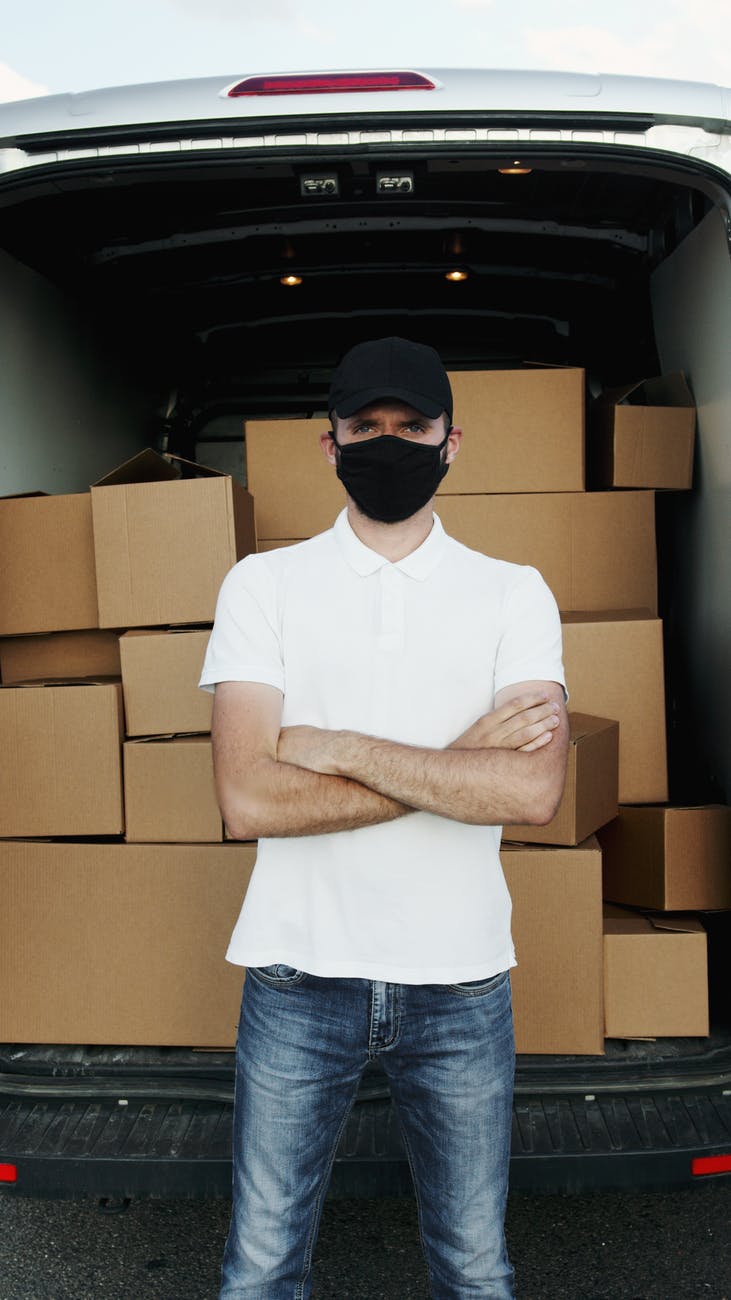 a deliveryman wearing facemask